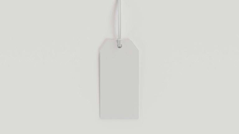 Plain white hang tag on a light background