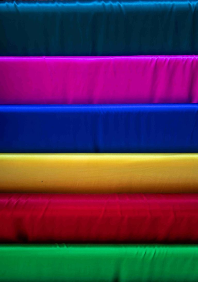 Stack of glossy sheets in many colours