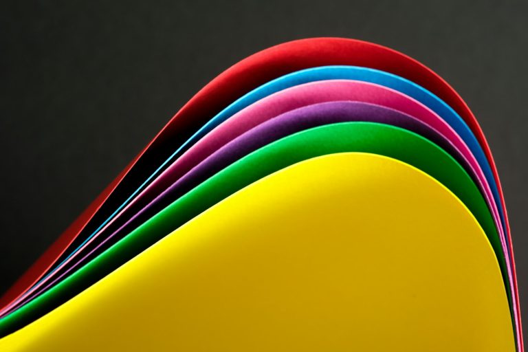 Fanned sheets in red, pink, green and yellow