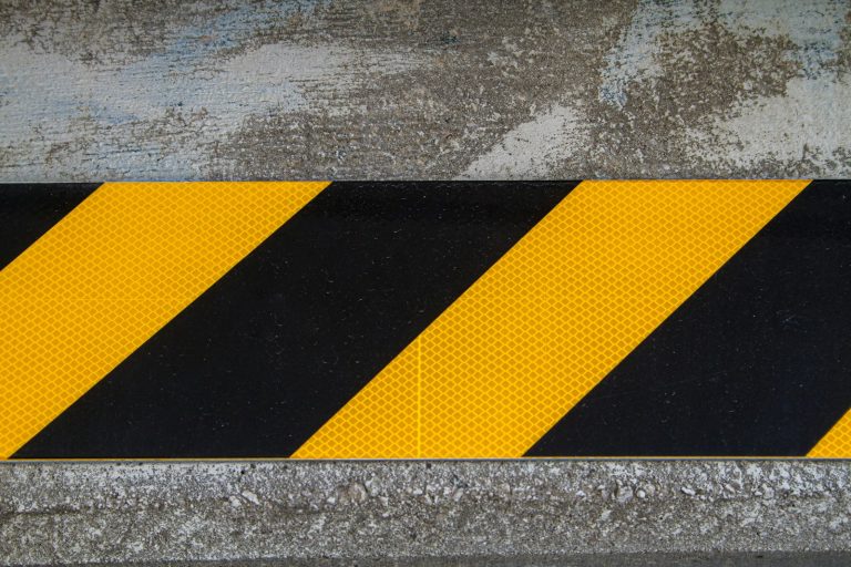Yellow and black reflective tape with a prism pattern