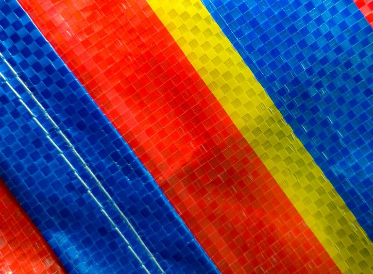 Red, yellow and blue reflective sheeting close up