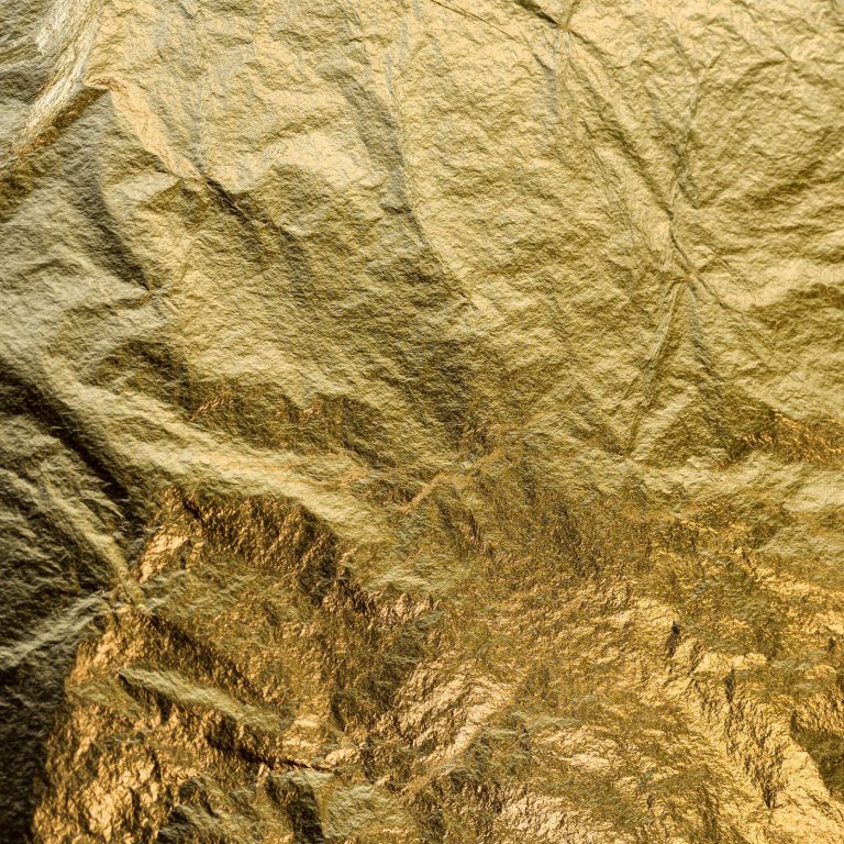Close-up of crinkled gold leaf