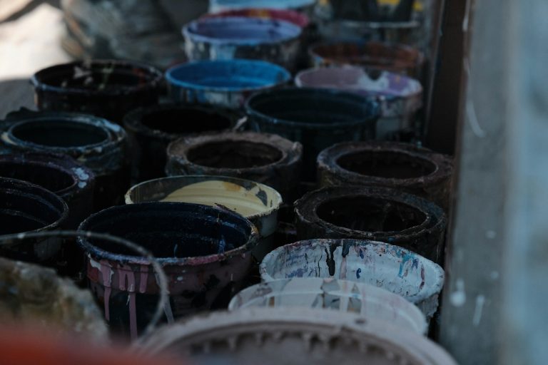 Rows of used ink tubs seen from above