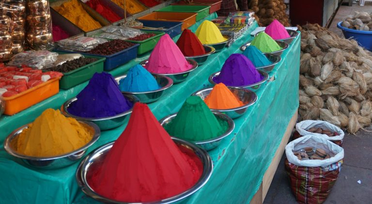 Cones of brightly coloured pigment powder